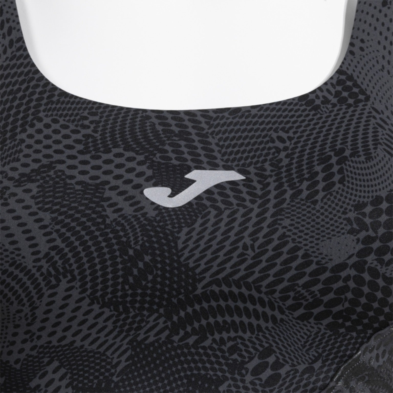 Top Joma R-City noir - détail logo réfléchissant